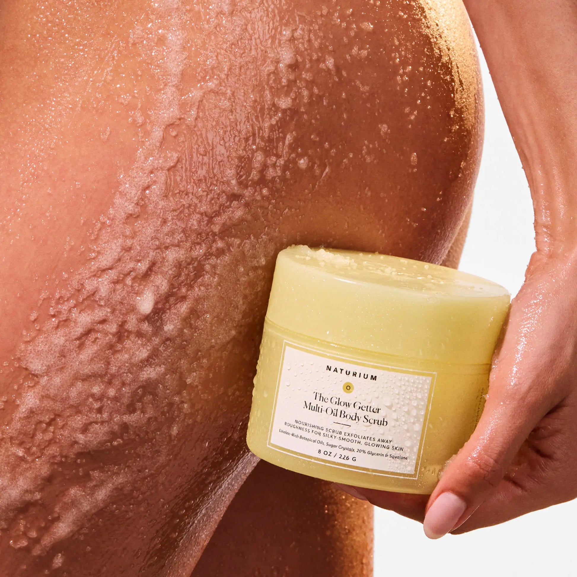 the-glow-getter-multi-oil-body-scrub-k6 NATR-40028-Alt-Image-The_Glow_Getter_Multi-Oil_Body_Scrub-07.webp