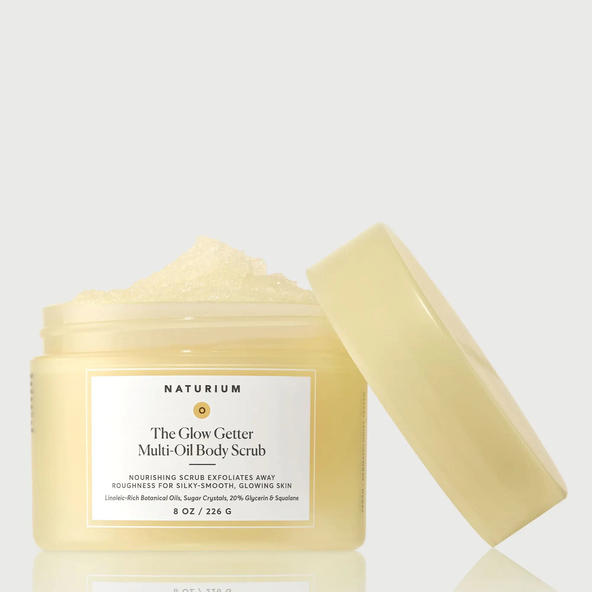 the-glow-getter-multi-oil-body-scrub-k6 NATR-40028-GlowGetter-Multi-Oil-Body-Scrub-Front-CapOff-bonebkgd.webp