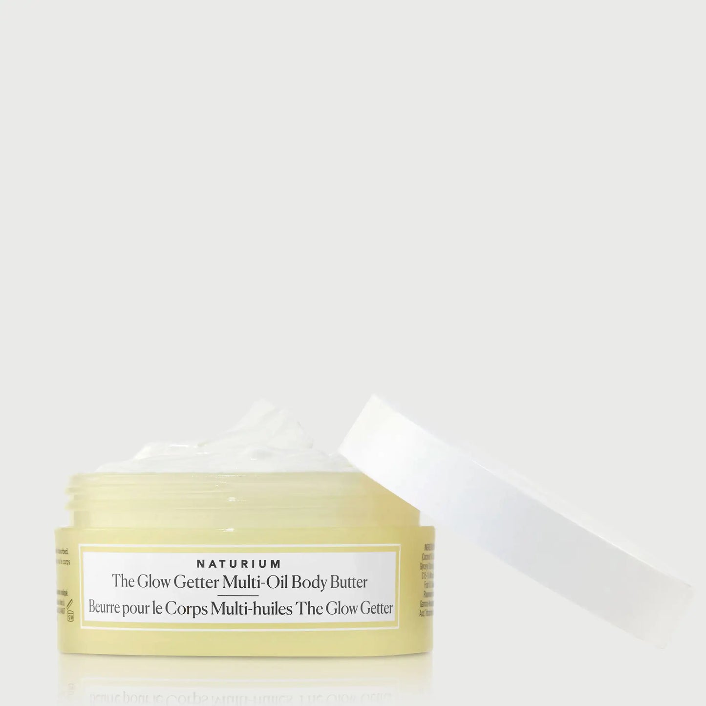 the-glow-getter-multi-oil-body-butter-travel-size-u9 NATR-40115_Glow-Getter-Body-Butter-Mini_front_capoff_bonebkgd.webp