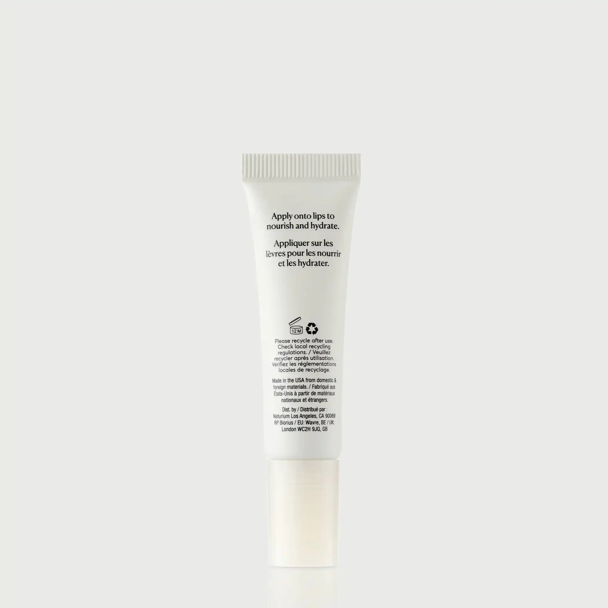 phyto-glow-lip-balm-clear-a0 NATR-60066_PhytoGlow_Clear_primary_capon_back-bonebkgd.webp