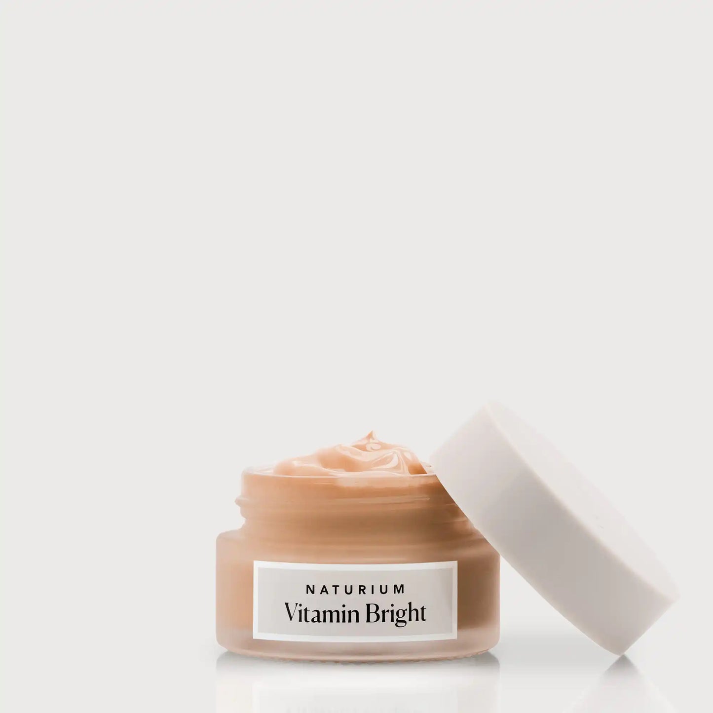 vitamin-bright-illuminating-eye-cream-r0 NATR-VitaminBright_DEEP_Primary_front_openjar_bone.webp